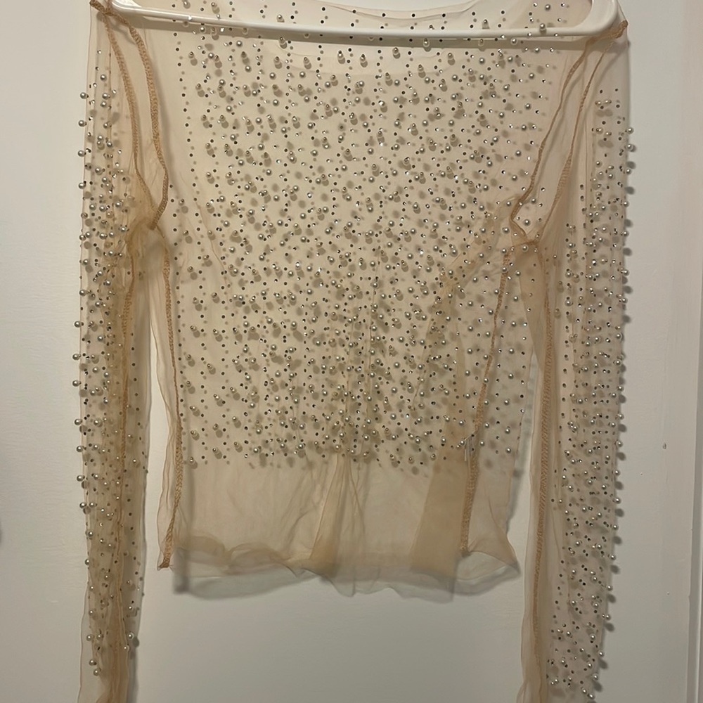 Sheer/nude overlay